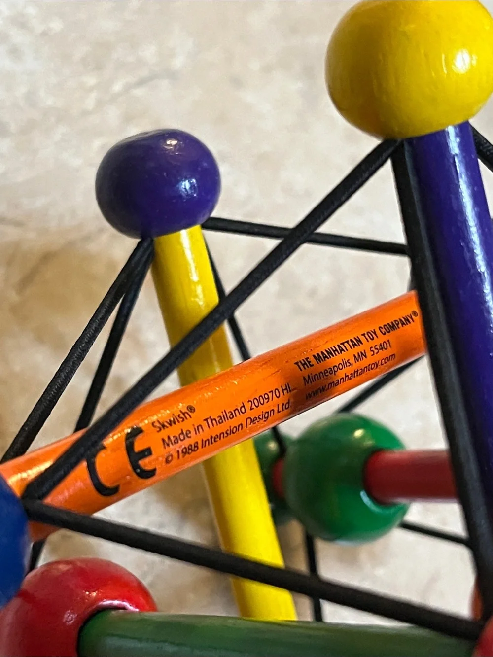 Skwish the manhattan toy company Wooden Activity Toy - Multicolor Sensory Ball